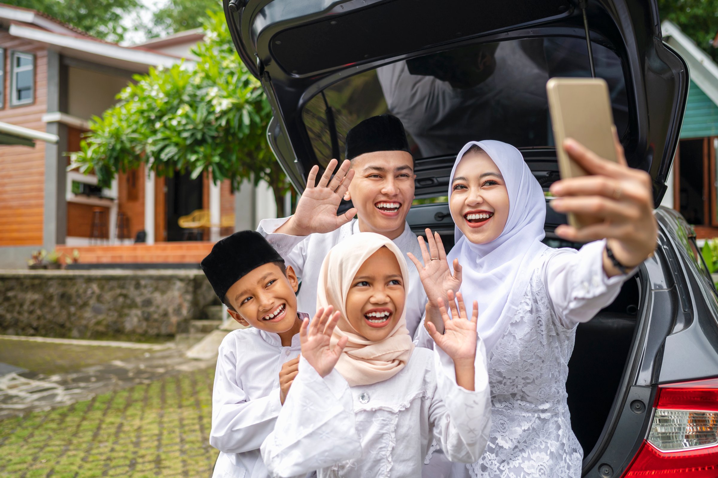 Happy Muslim family traveling together