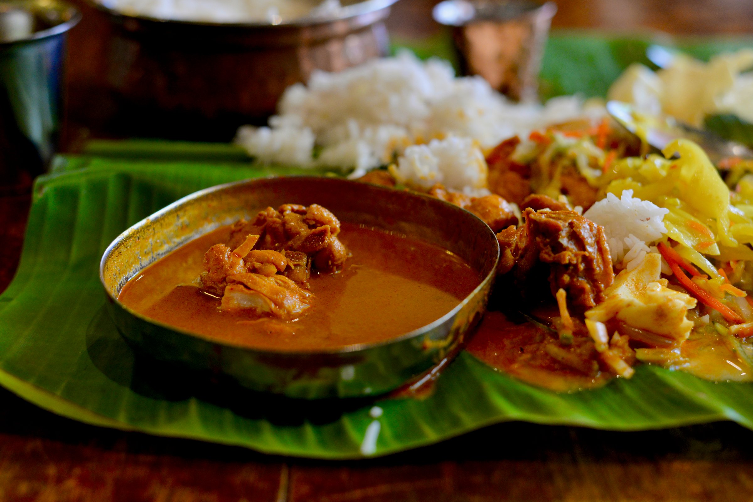 Indian, Tamil Nadu, Southern Indian Food from Little India in Georgetown, Penang - Banana leaf Chicken Curry set, with Rice, Egg and assorted Indian pickles and sauces