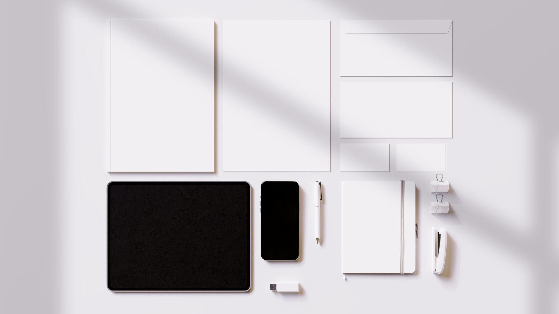 Branding stationery set mockup with smartphone and tablet included. High Quality, 8K Resolution. Ideal for creating mockups and presentations