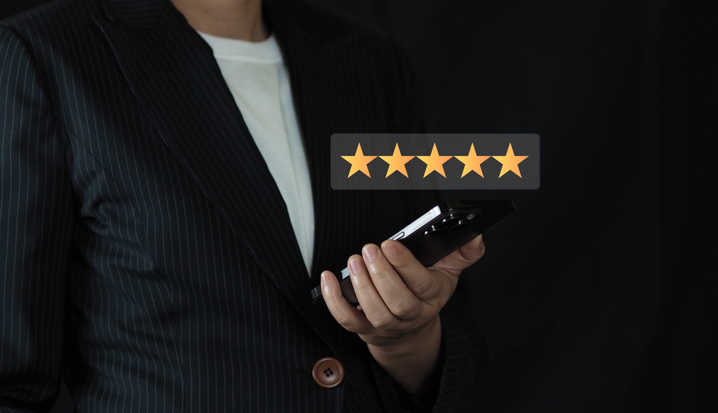 service concept, Customer service experience and business satisfaction survey. close up Woman hand using smart phone and give five star symbol to increase rating of product.