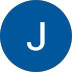 White letter J on a blue circular background, resembling a simple logo or icon.