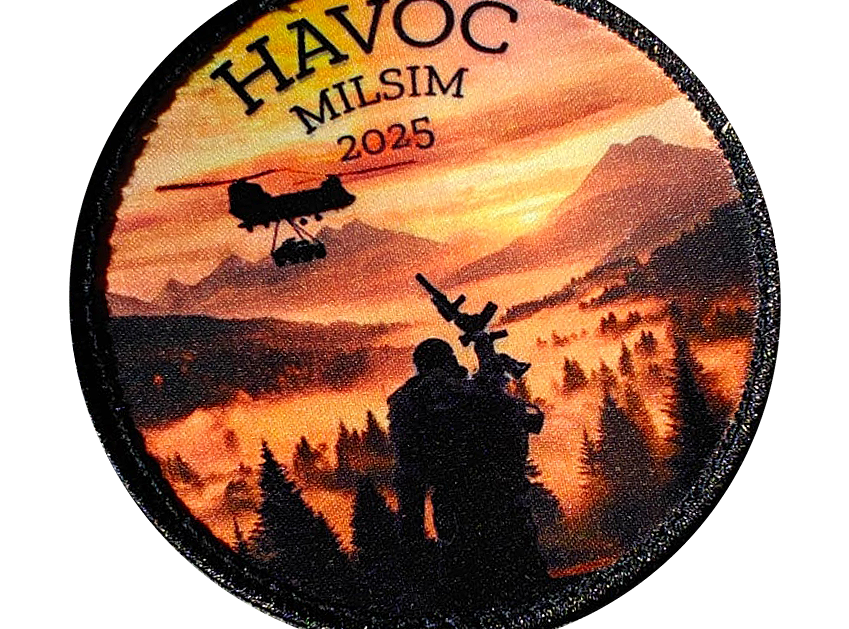 Circular patch with HAVOC MILSIM 2025 and silhouette of a soldier and helicopter over a sunset mountain landscape.