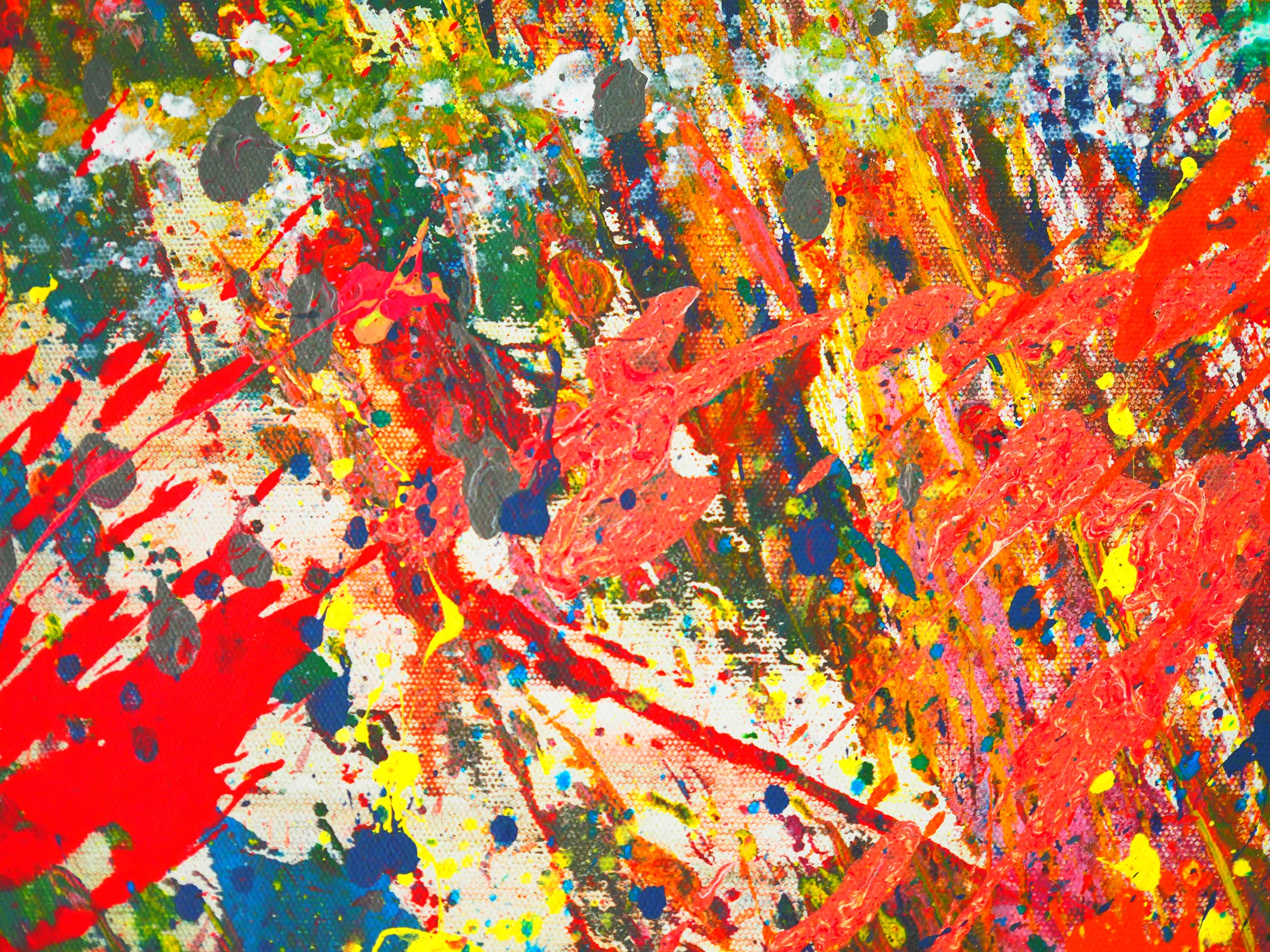 Abstract of vibrant colors splattered across the canvas