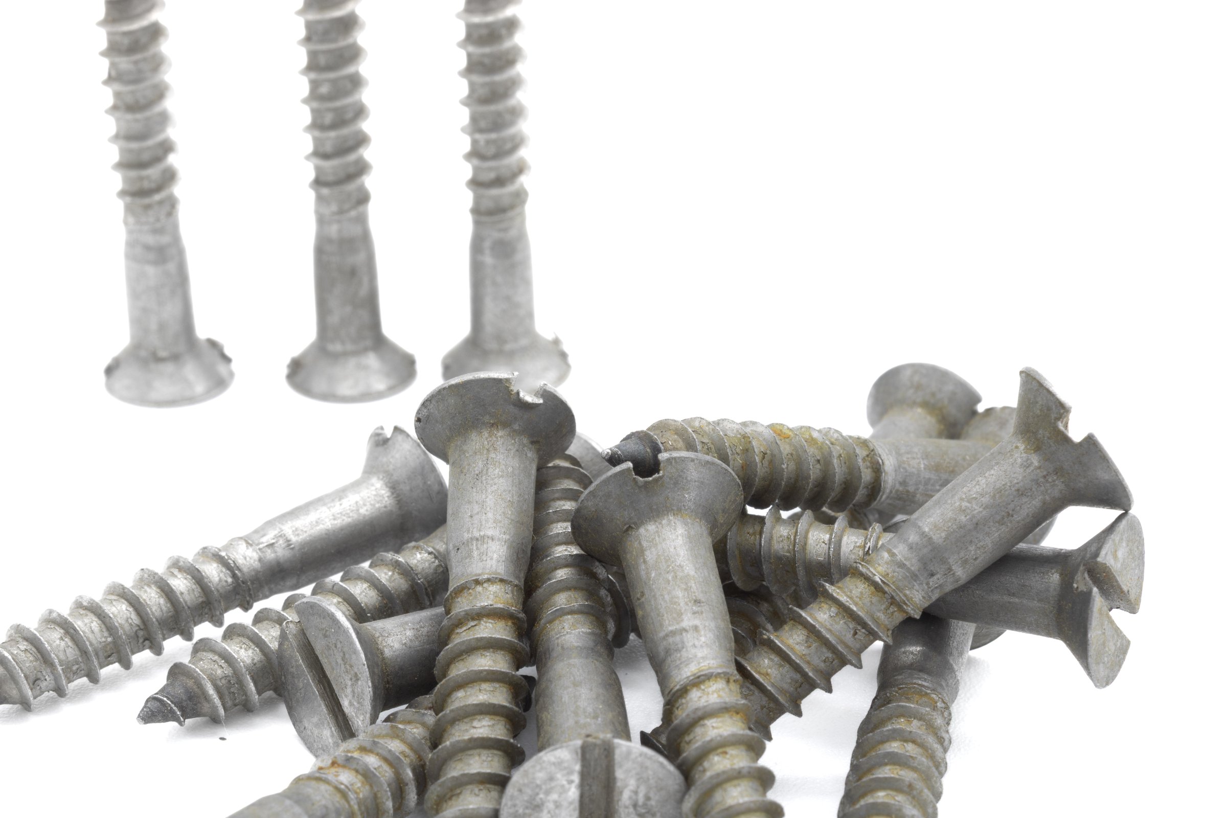 Wood screw or flat head wood screw, used for carpentry, on a white background