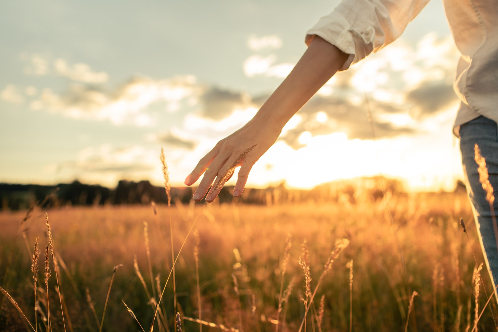 Girl walking in the meadow.
