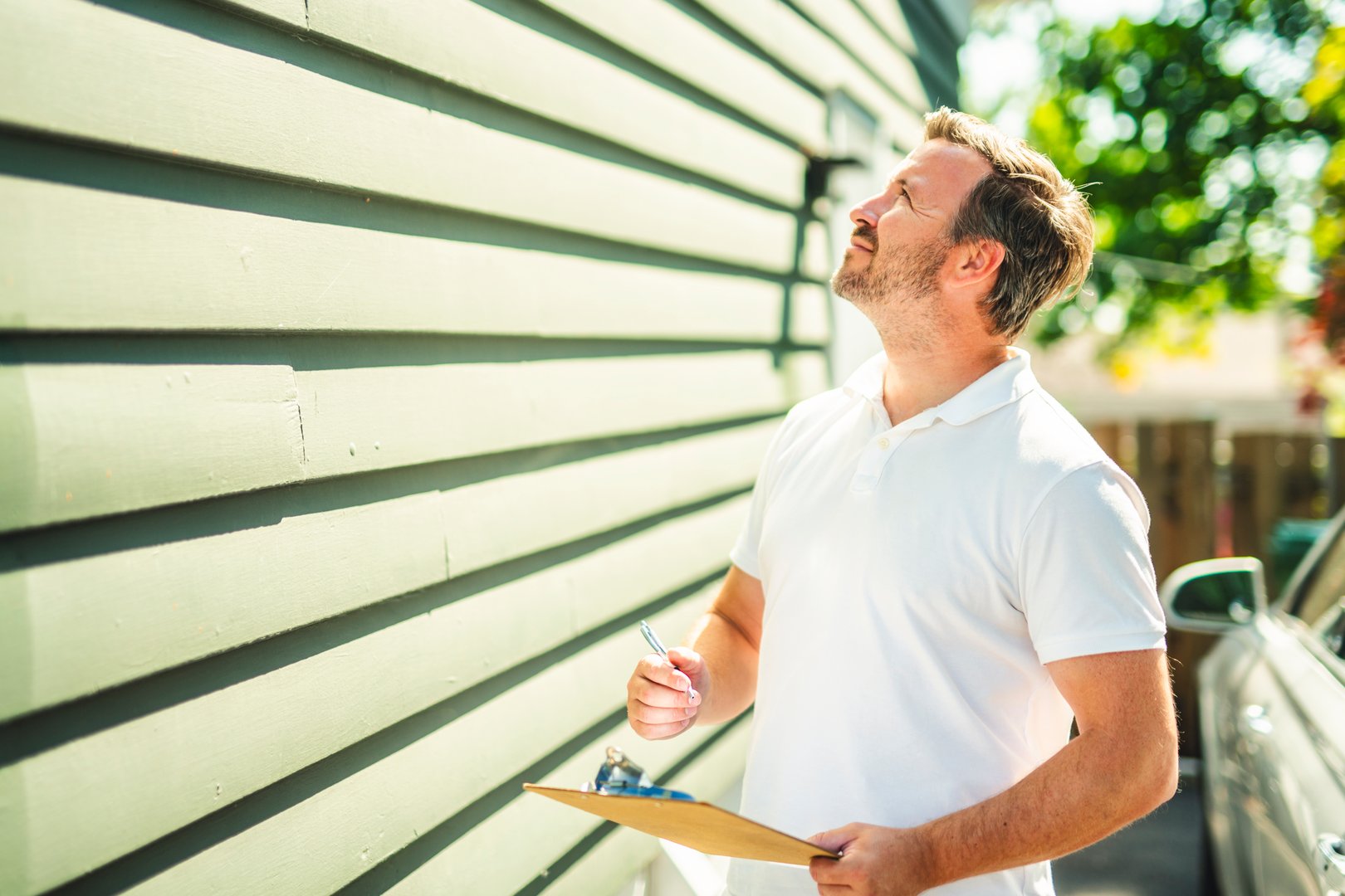 The inspector or engineer is checking the building structure and house. After the renovate is complete