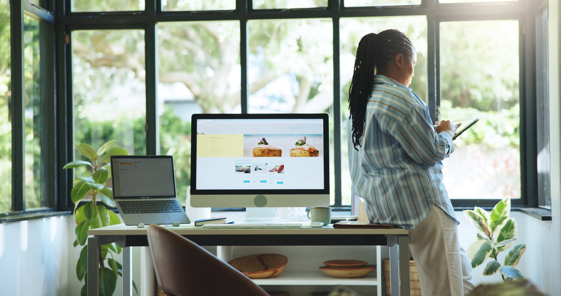 Freelancer, tablet and back of black woman in home office for web designer, research and planning. Blog ui developer, remote worker and homepage portfolio with person in apartment for online project