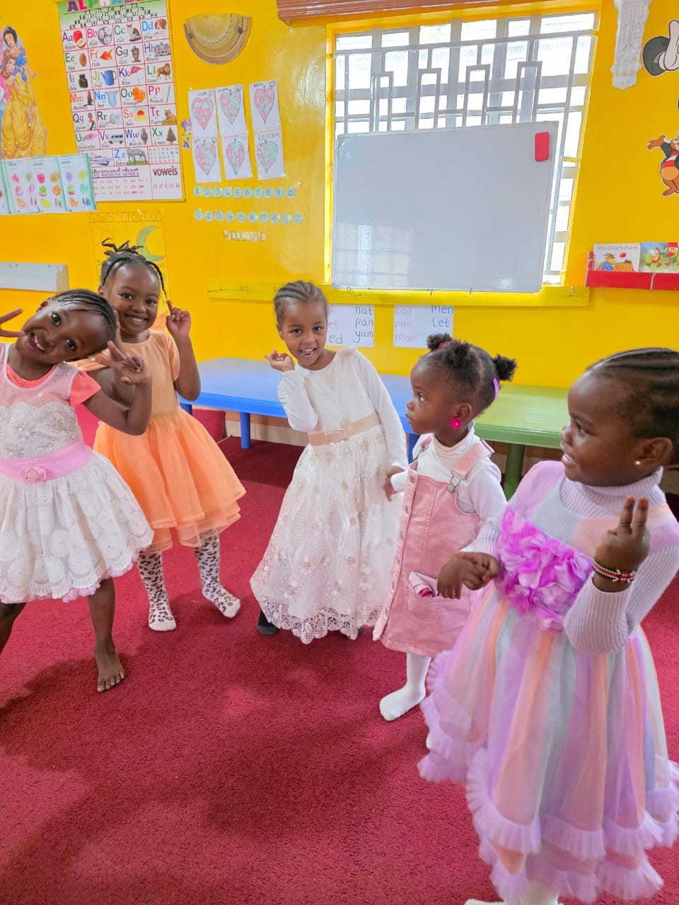 Kindernest preschool students and activities - happy children learning and playing