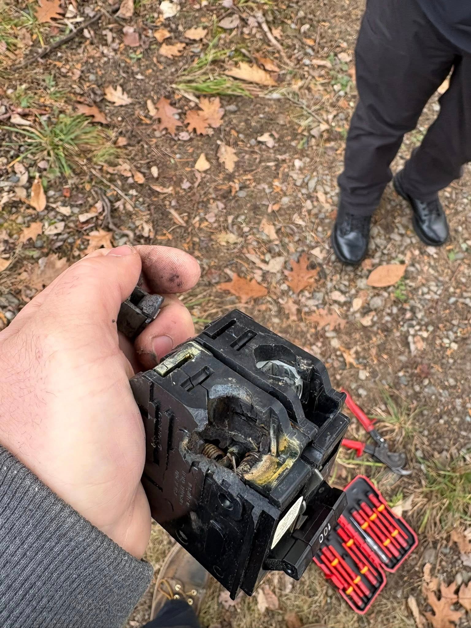 Damaged electrical main before repair