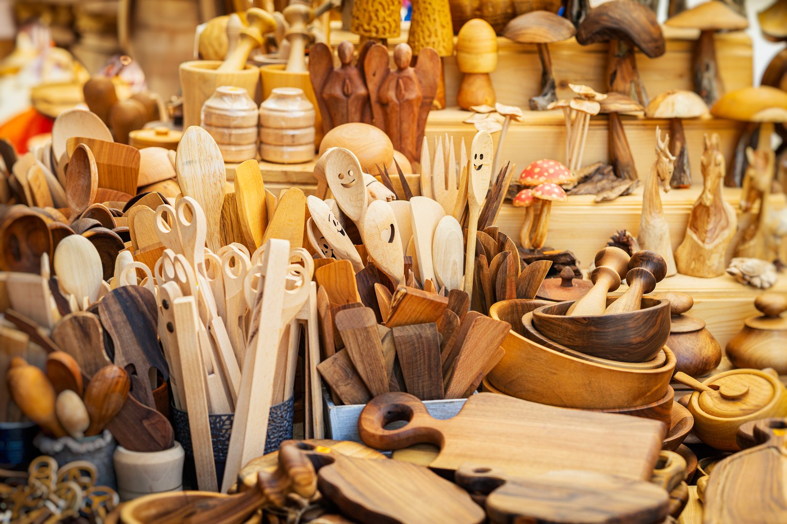 Variety of handcrafted wooden kitchen utensils and home decor items for custom laser engraving