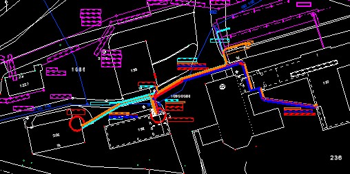 Technical drawing with colorful lines and shapes on a black background, indicating pathways and structures.
