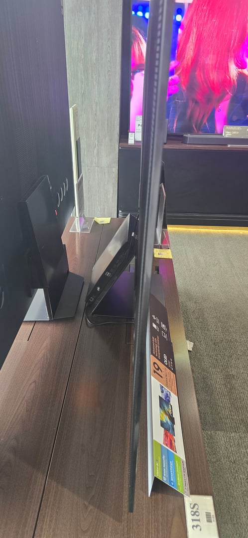 Samsung S95F QD-OLED TV side profile showing ultra-thin design