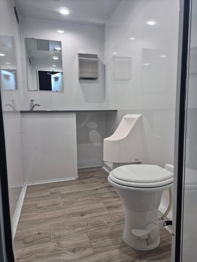 Interior of a luxury portable restroom with elegant fixtures