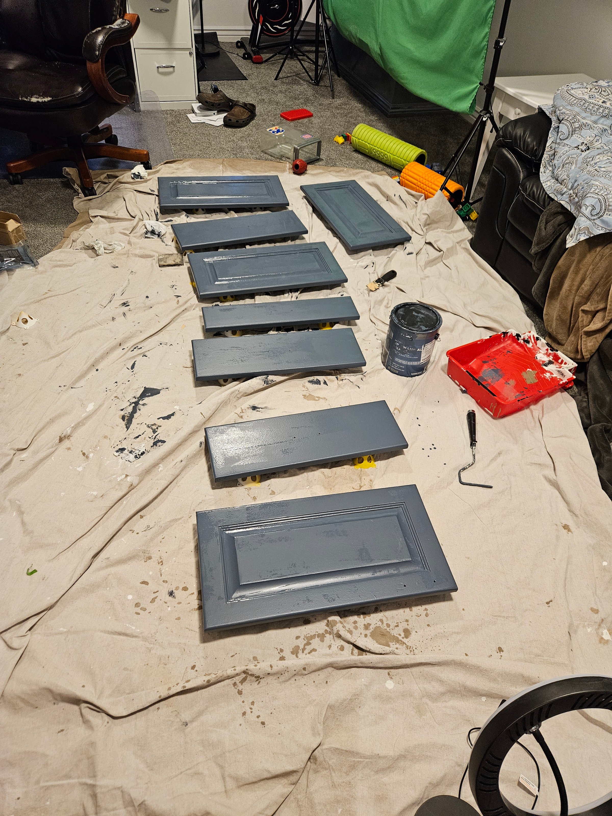 Close-up of navy Behr NYPD painted vanity with oil-rubbed bronze hardware
