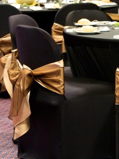 Colorful chair covers with decorative bows