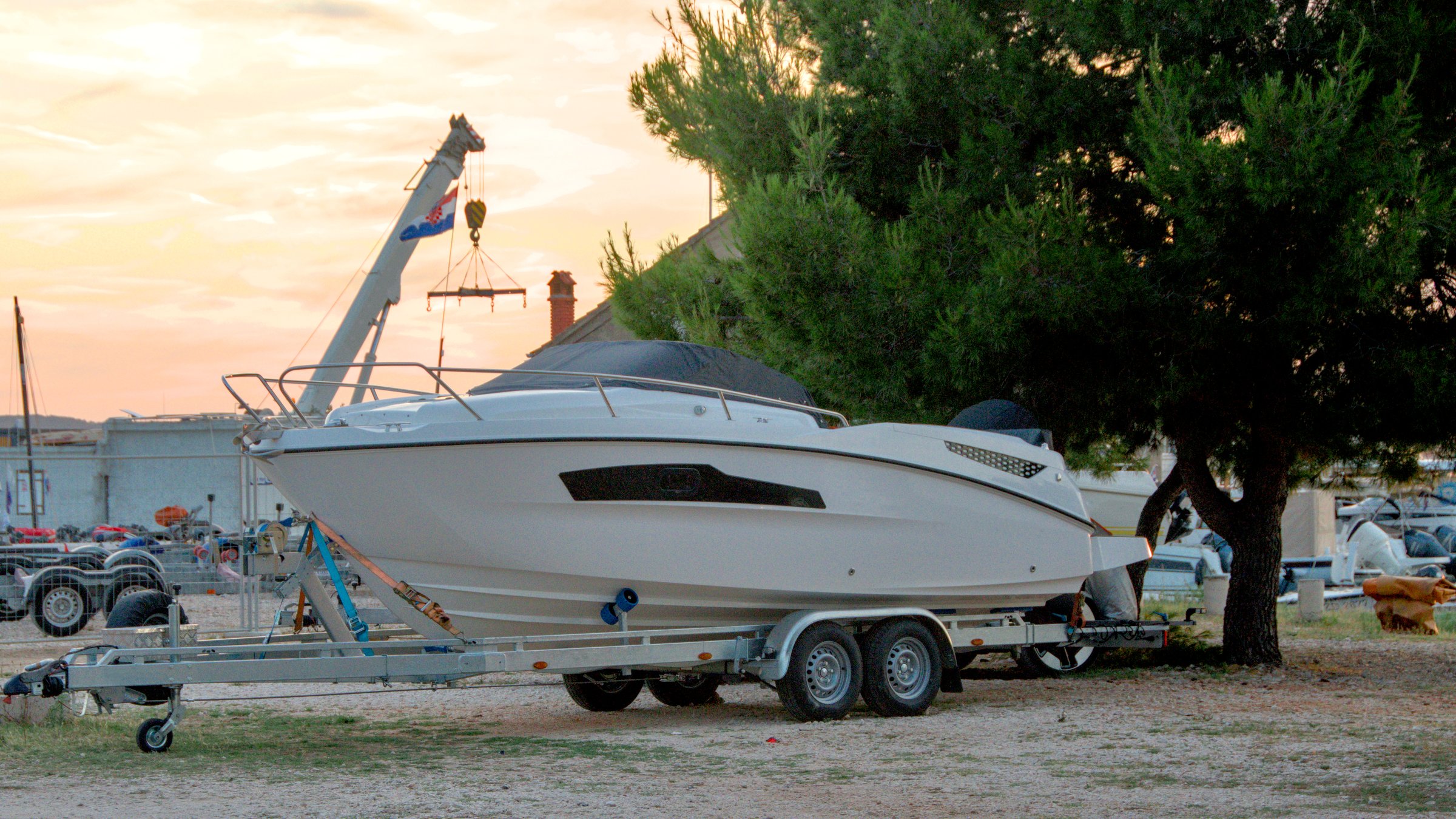 large boat on trailer on croatian coast. High quality photo