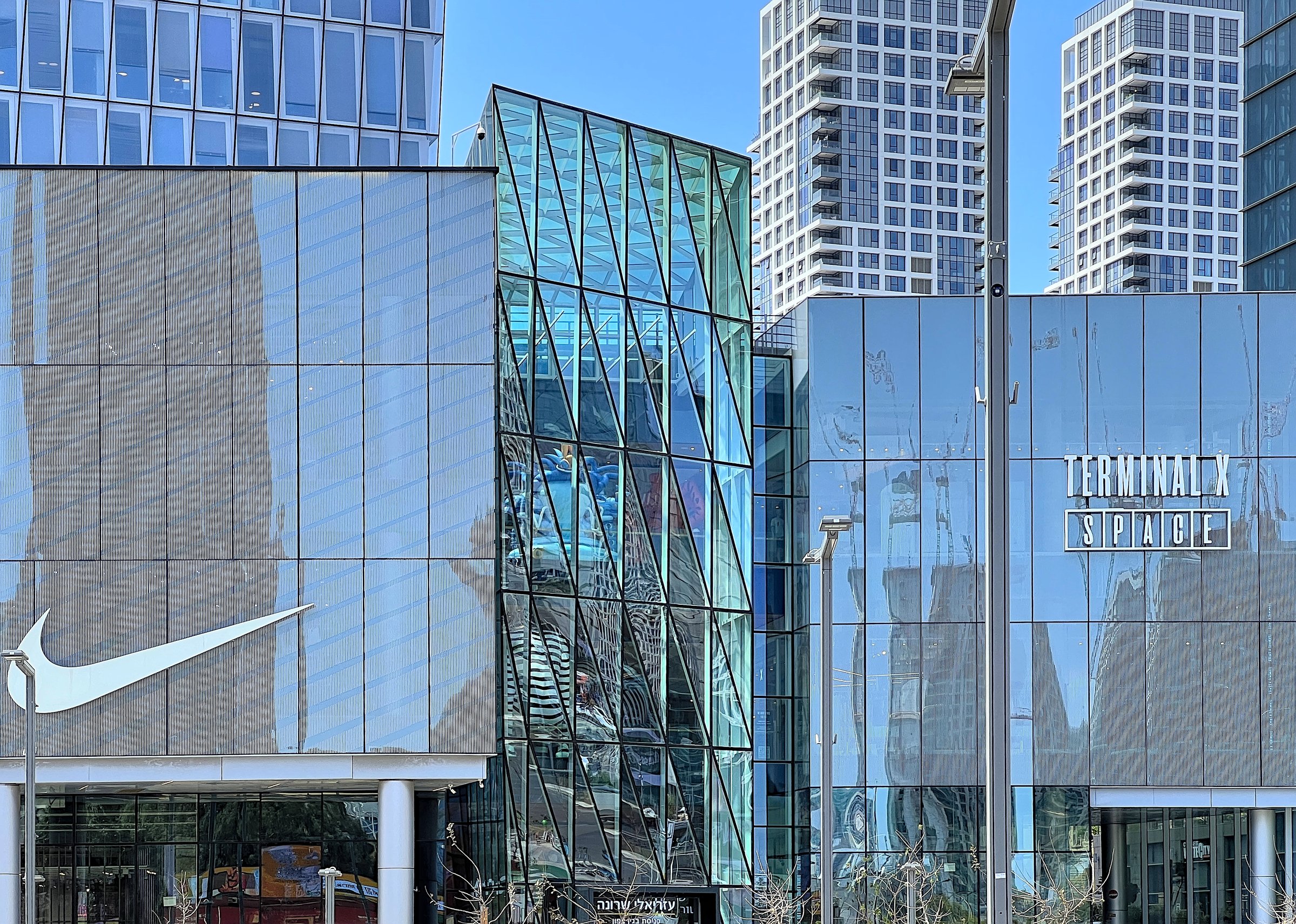 Tel Aviv Israel 04/02/2024 Nike and Terminal X signs on the Azrieli Mall Sharona