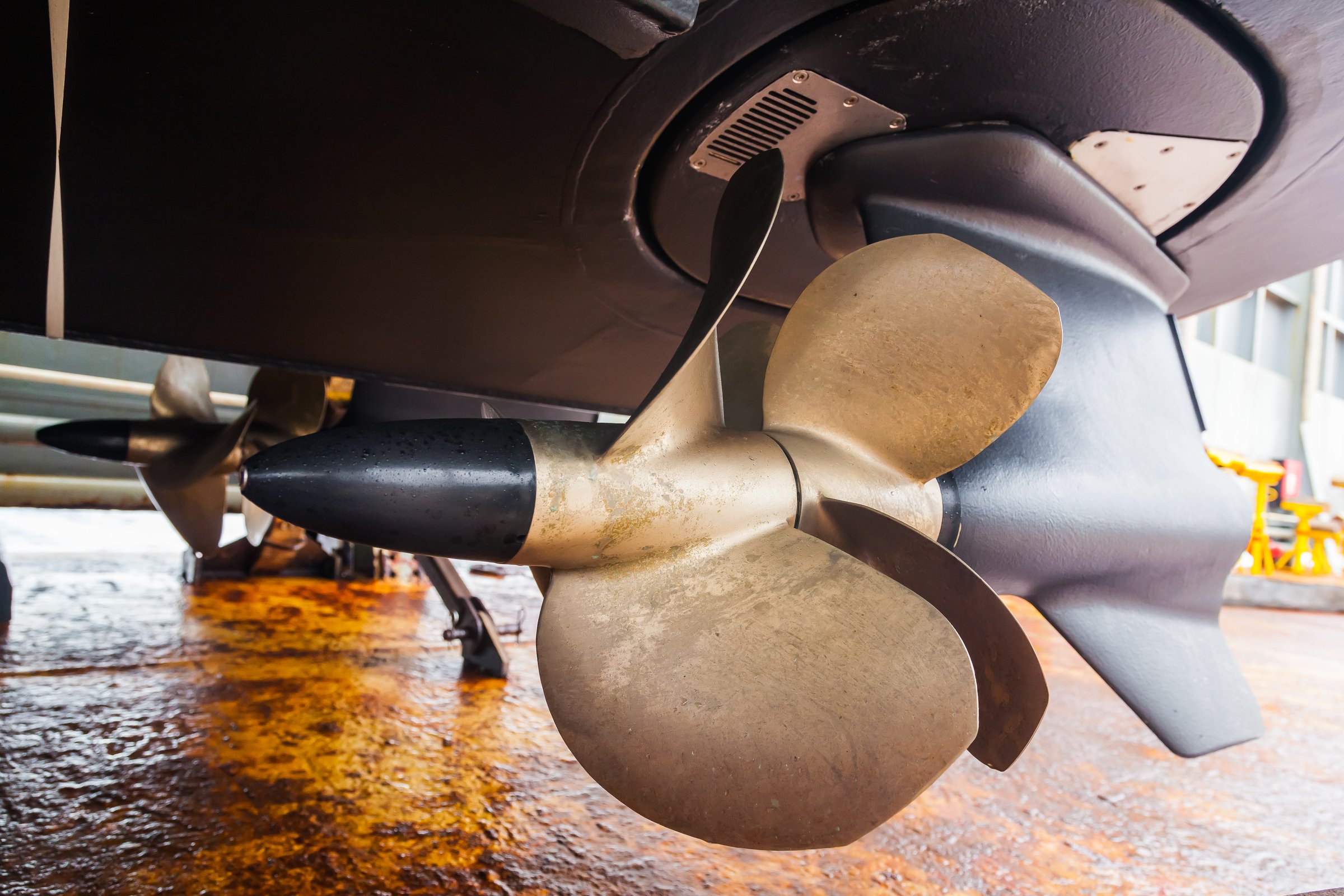 Azimuth twin-screw motor on a motor boat, bottom view. The bottom of a motor boat with azimuth motors with a double row of propellers.