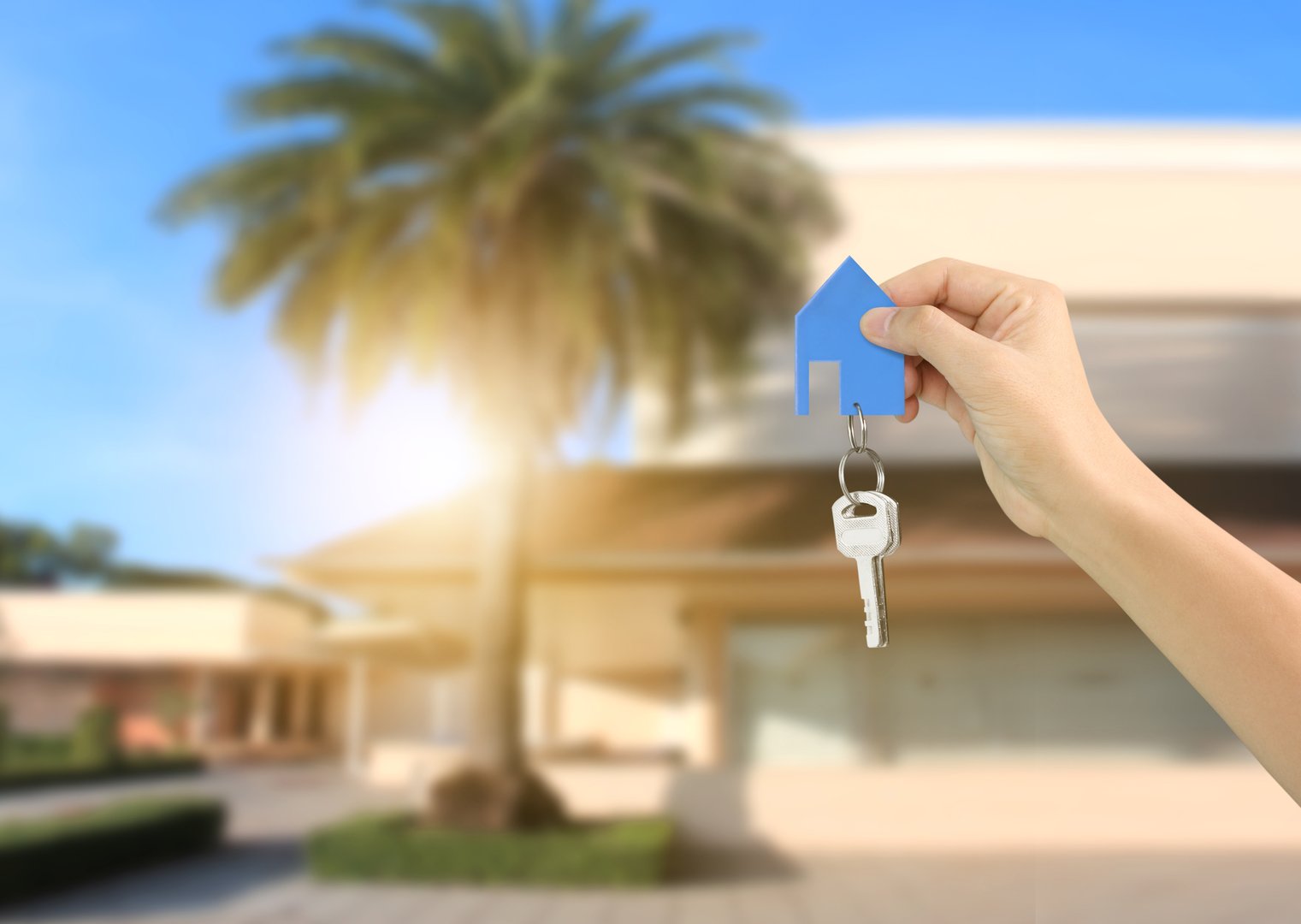 Investment concept ,House key in hand