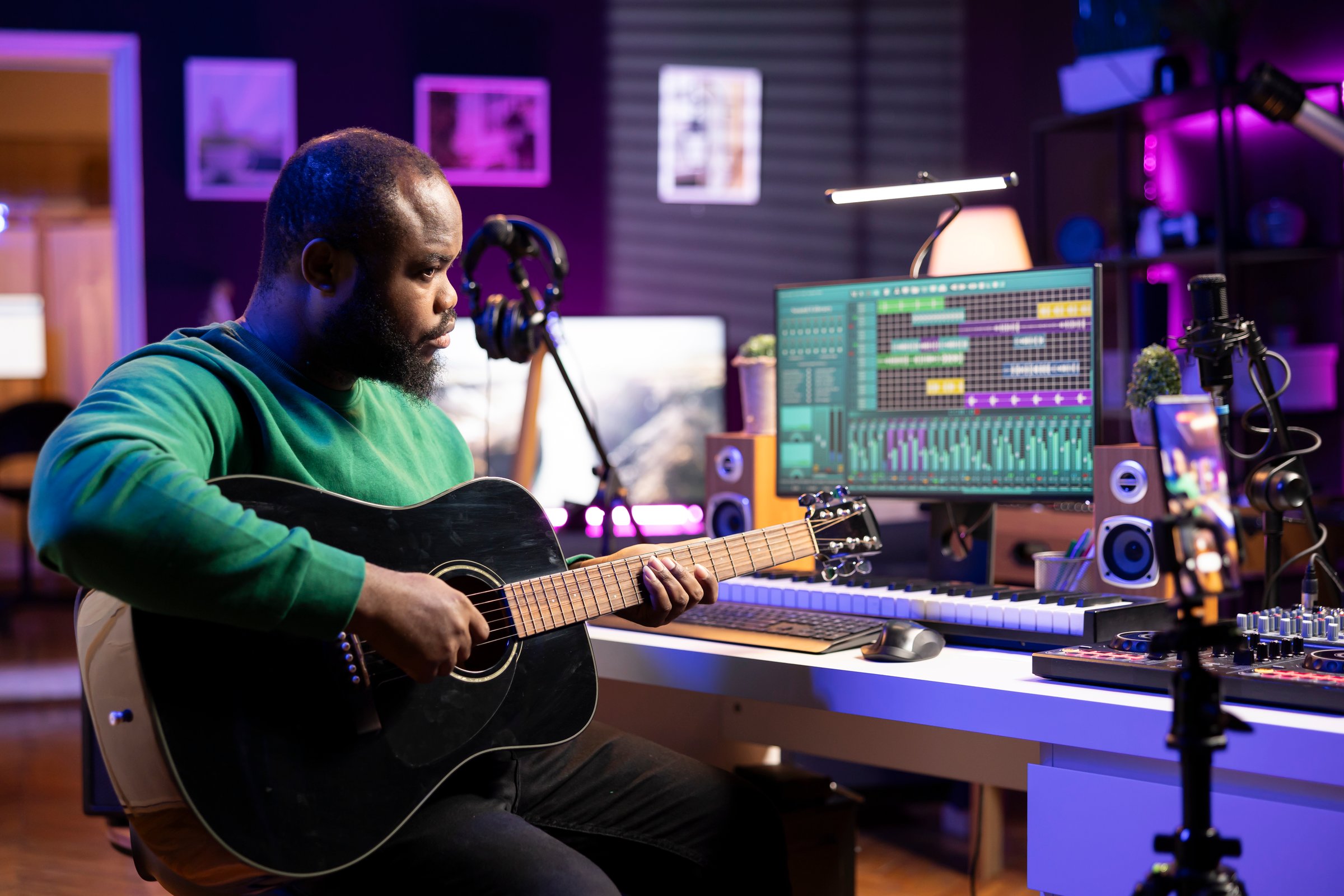 Talented performer teaching how to play acoustic guitar online for a tutorial, hosting internet master class lessons to provide advice for beginners. Artist composer explaining accords on strings.