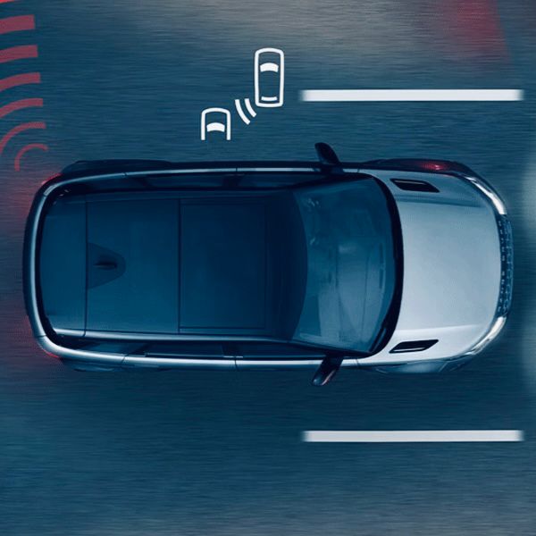 Blind Spot Assist warning indicator on side mirror alerting driver to vehicle in blind spot