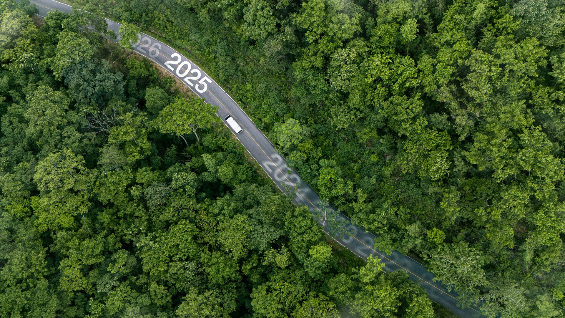 2025 Goal. Green Business Development for Sustainable Environmental Goals. Environmentally Friendly Technology Concept. Clean and Green Transportation Without Greenhouse Gases in Electric Drive System.