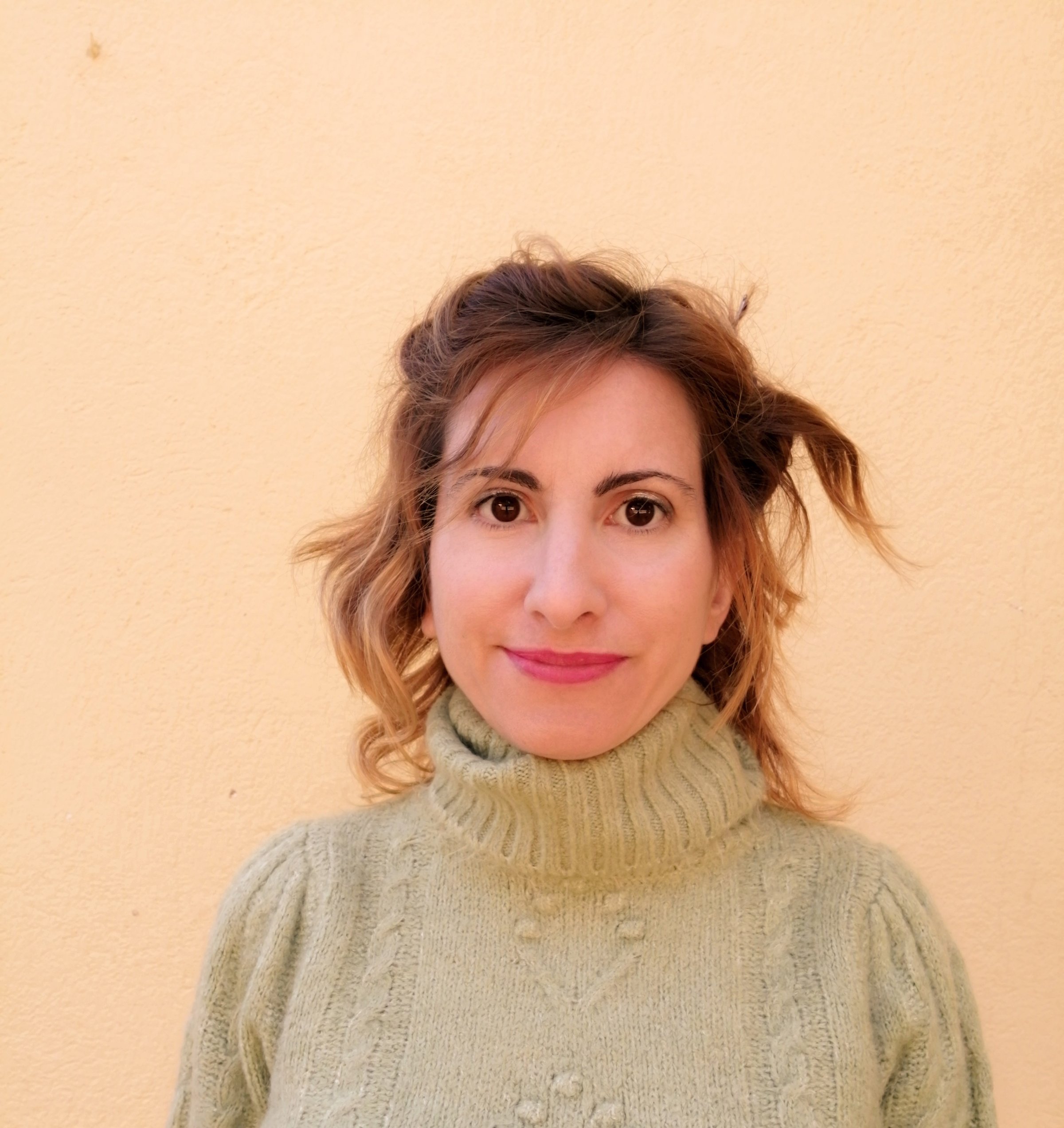 portrait photo of a woman dressed in winter sweater