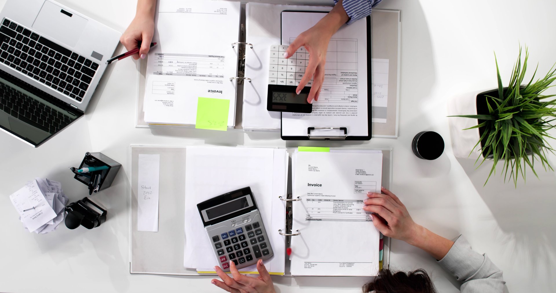 Top view of young woman accountant doing tax audit work