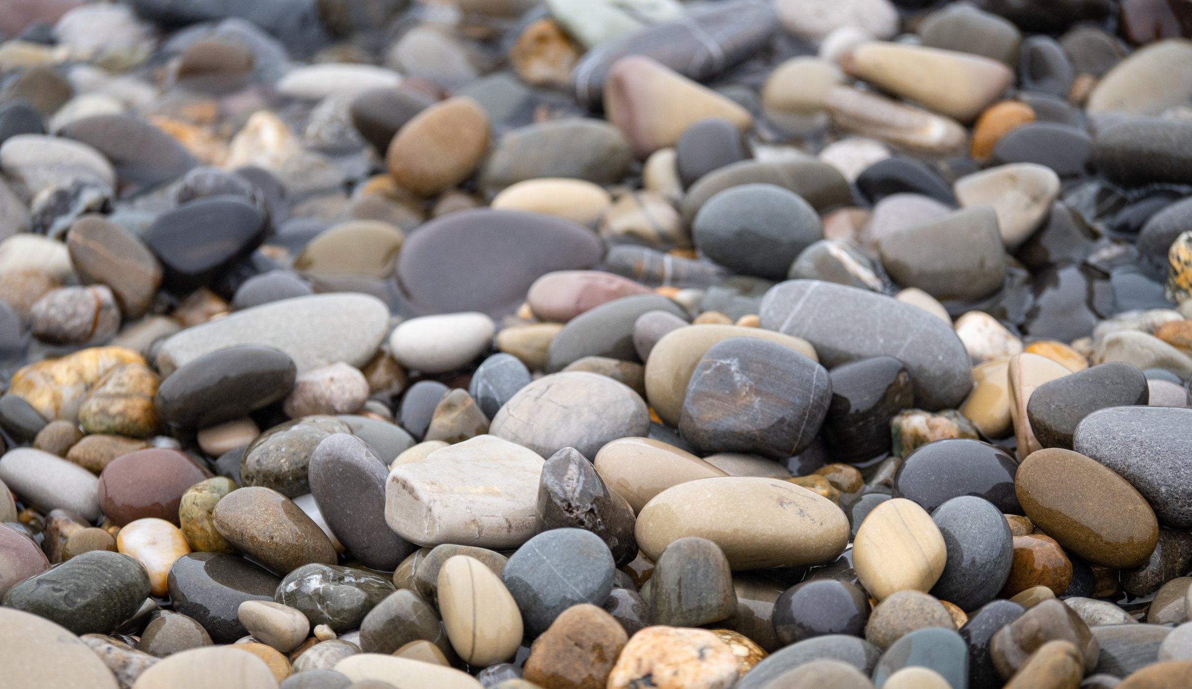 Sea stones. Smooth pebble background