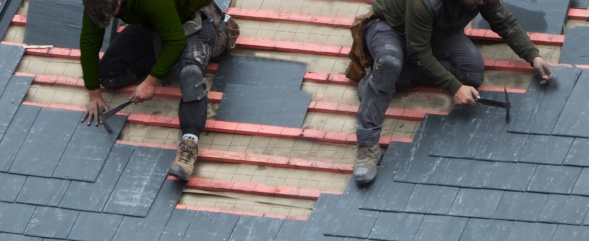 Skilled roofing craftsmen fitting tiles in Tunstall Stoke-on-Trent - Quality roof installation Staffordshire