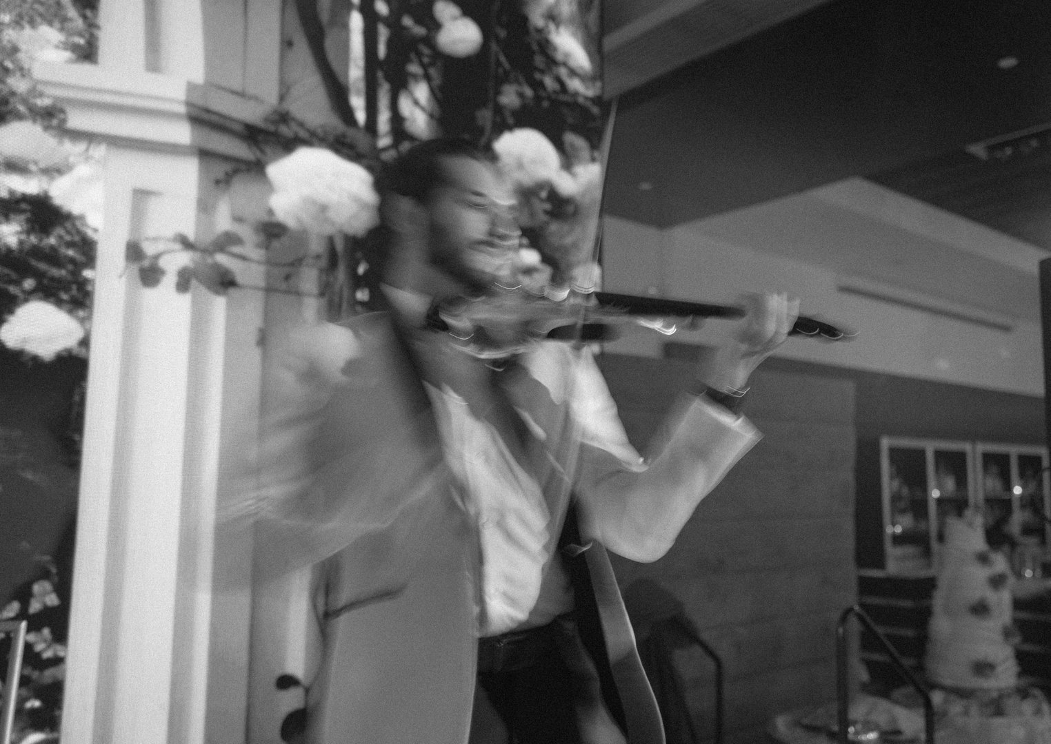 Wedding reception venue decorated with flowers