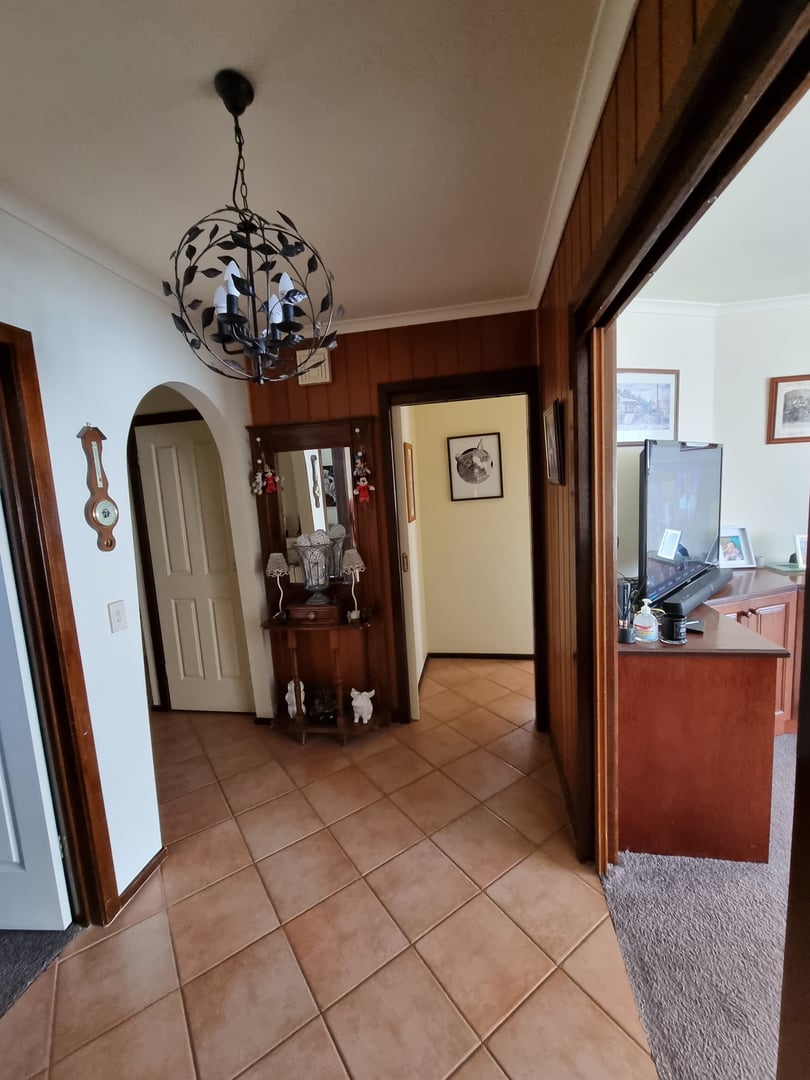 Interior room before Quality Painting Group transformation - original wall condition October 2021