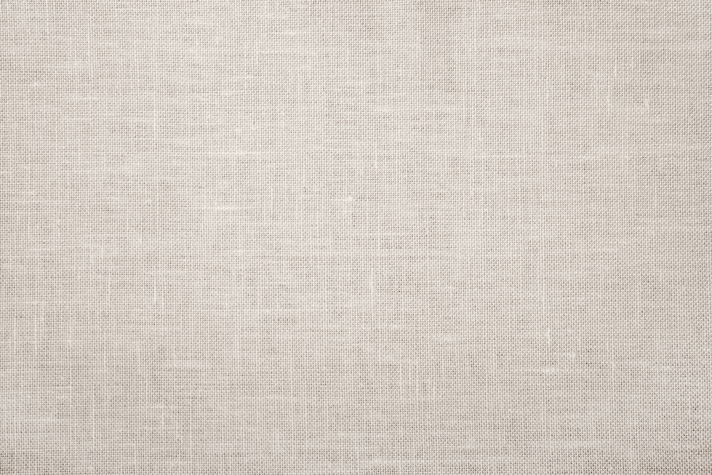Texture of beige linen fabric.