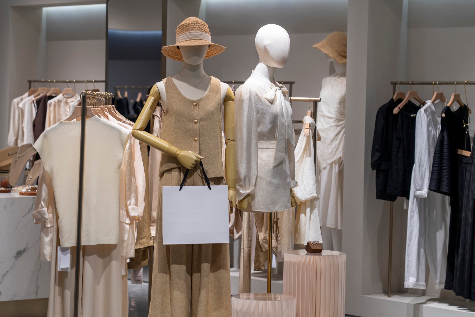 Women choose clothes in clothing stores