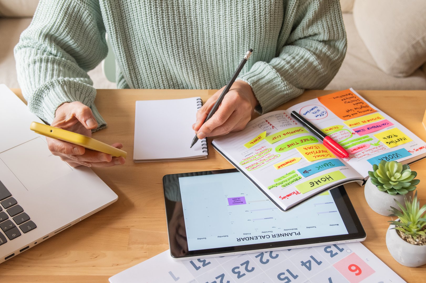 Professional Woman At Home Or Office Organizing Her Digital Planner, Setting Appointments, Checking Emails, Planning Budgets, Tracking Expenses, Paying Bills, And Achieving Time Management Goals
