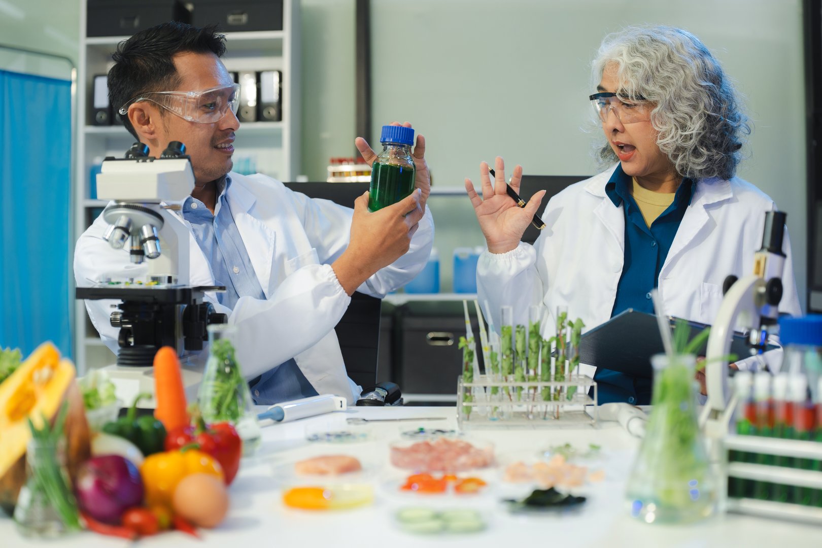 Microbiologist Working on Molecule Samples in Modern Food Science Laboratory, Control experts inspect the concentration of chemical residues. hazards, standard, contaminate.