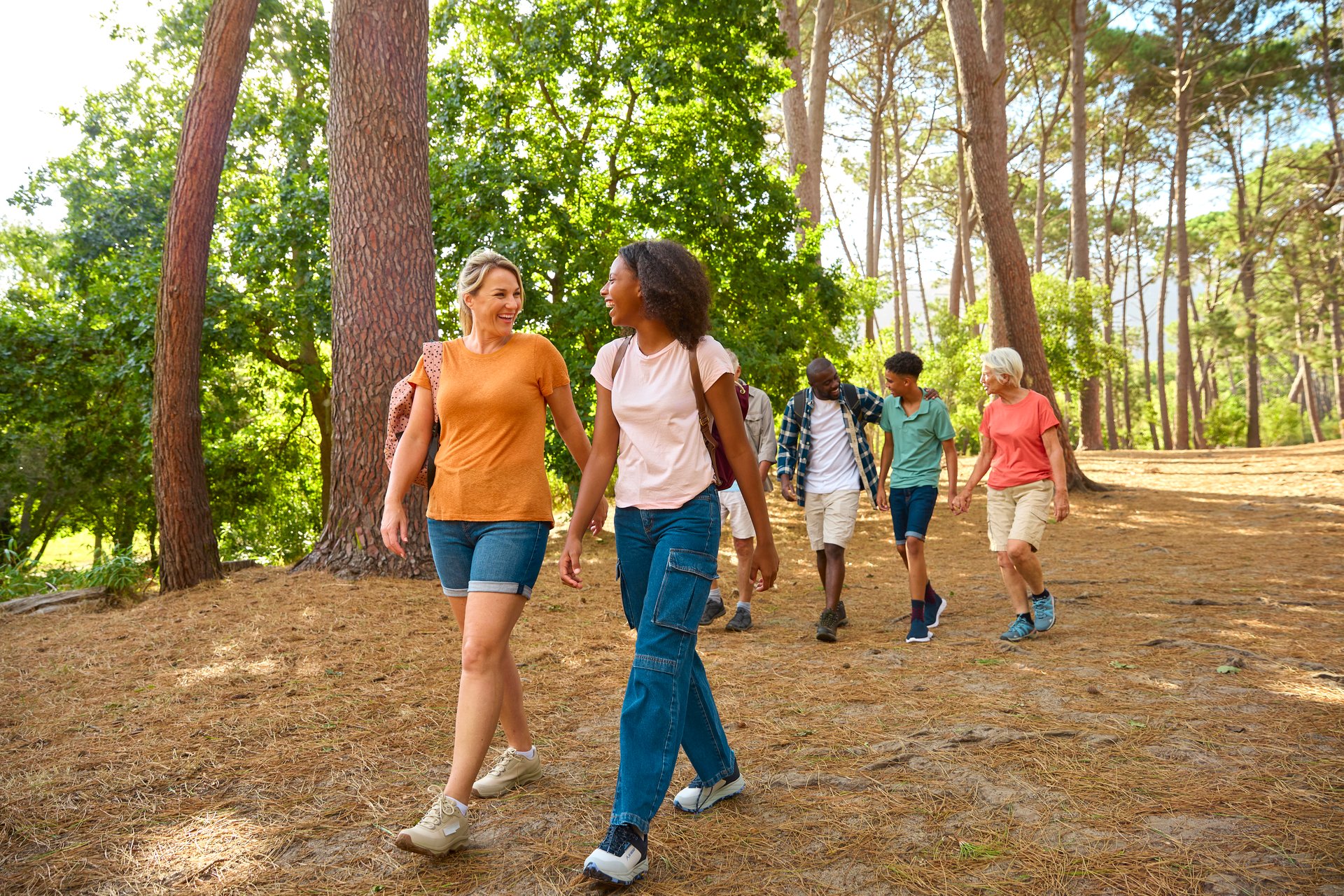 Active Three Generation Family On Outdoor Hike In Countryside Together