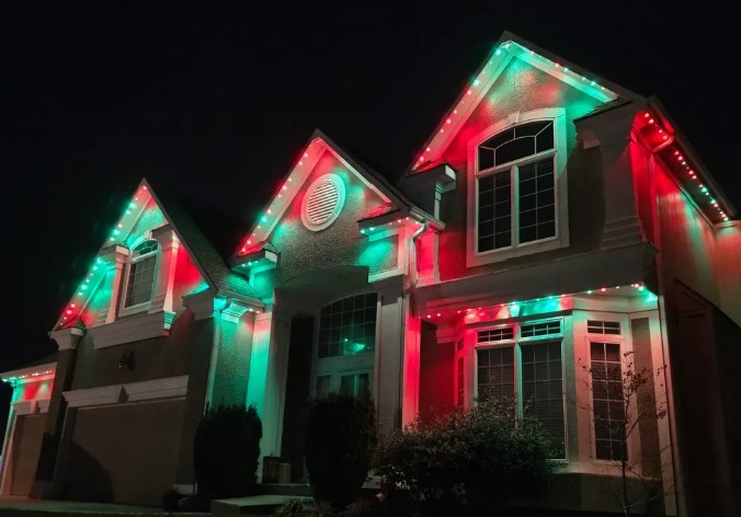 House with red and green LED lighting display