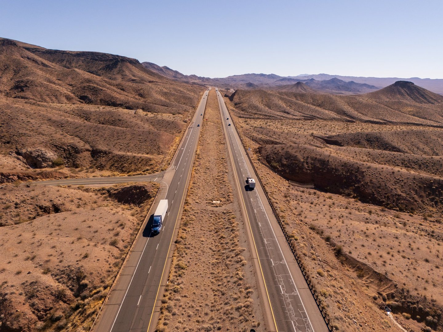 Scenic highway road through desert mountains
