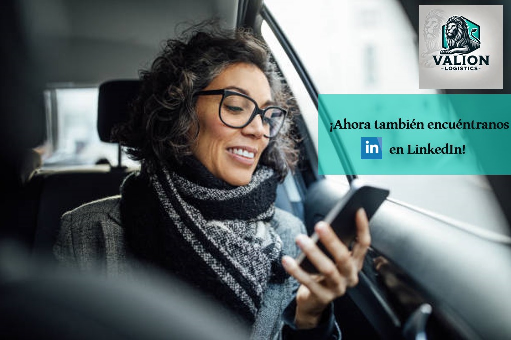 Woman smiling at phone in a car, Valion Logistics logo, "Encuéntranos en LinkedIn" text on a banner.