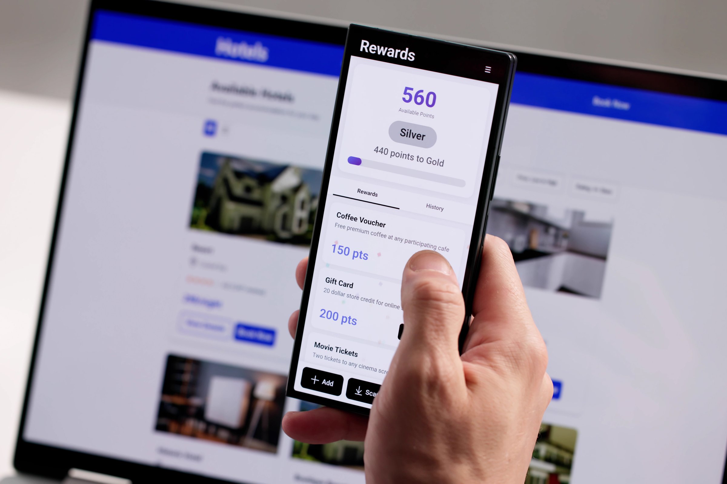 Man Earns Loyalty Points Using Smartphone App For Retail Rewards.