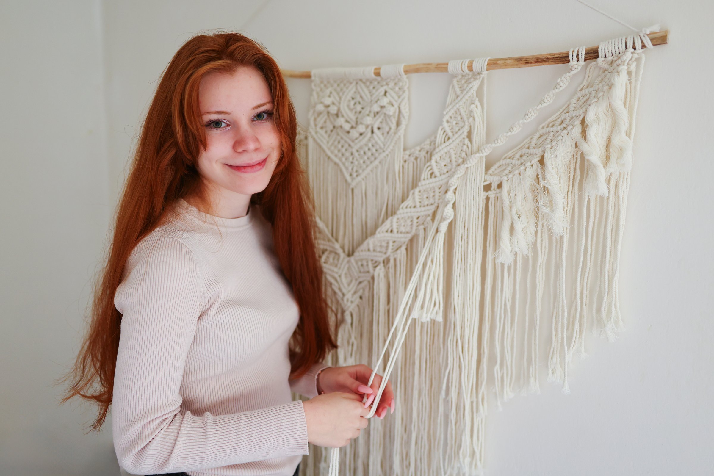 Girl working on macrame