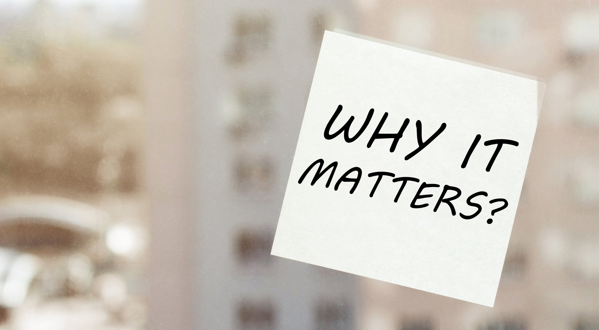white paper with text Why It Matters on the window