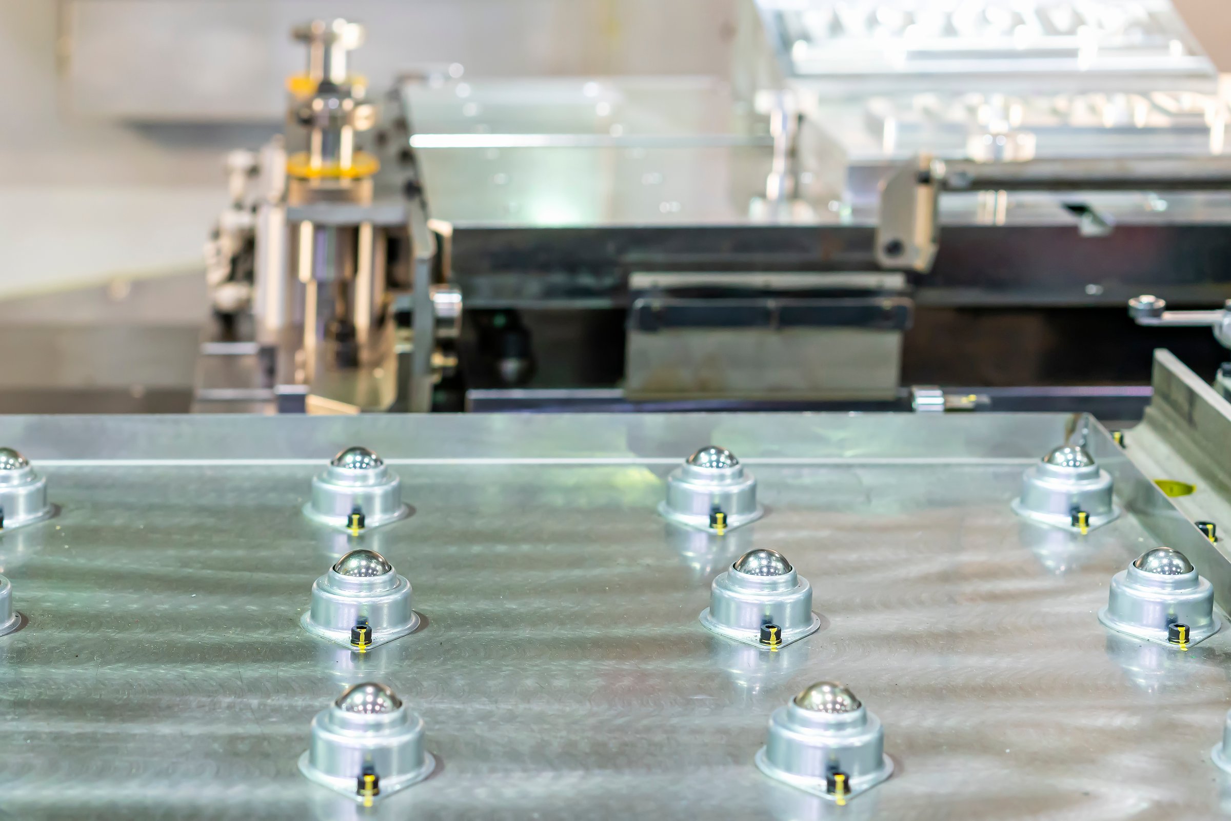 ball bearing transfer for conveyor transport or move product or goods or material in production line in manufacturing process