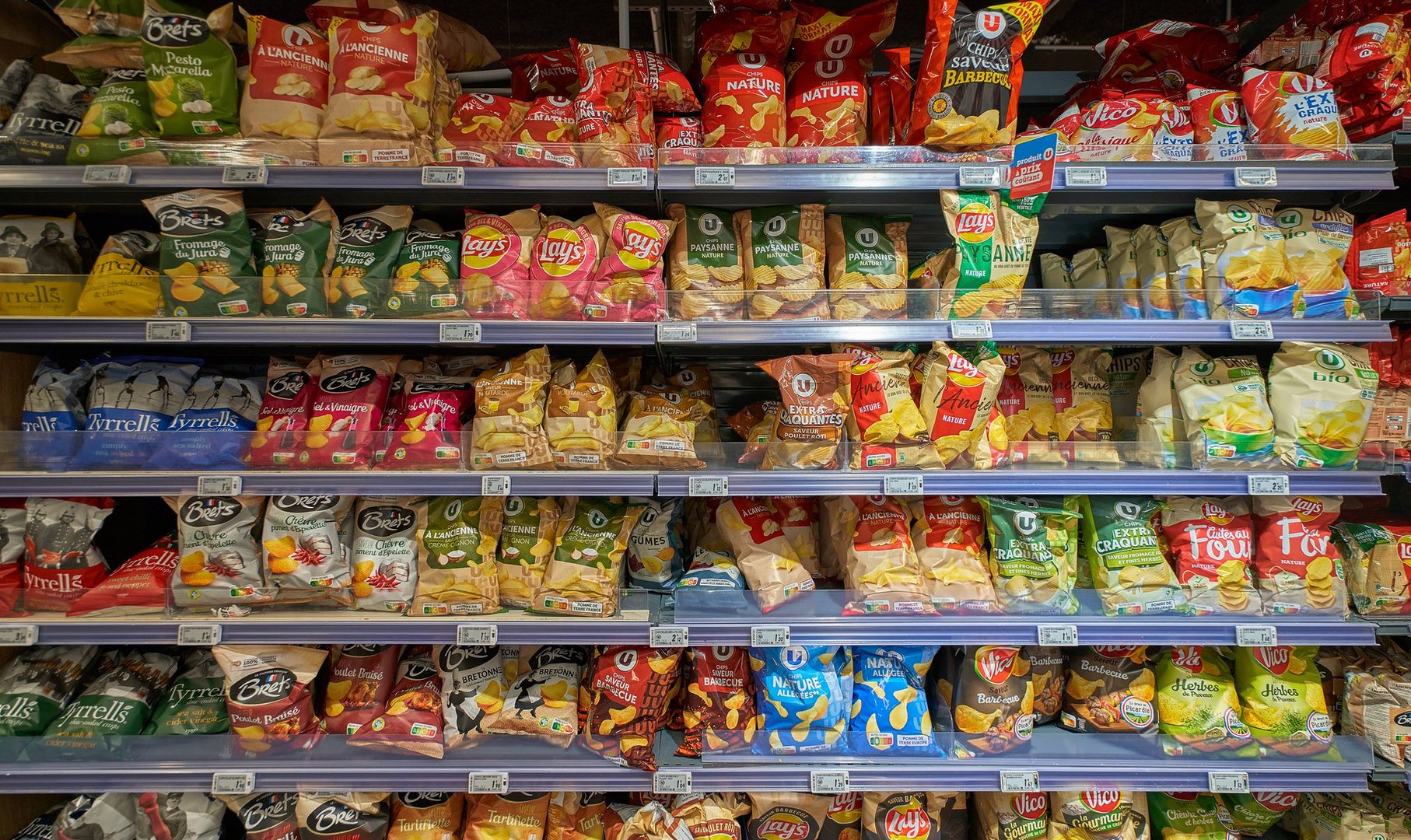 Colorful shelves in a supermarket with many products