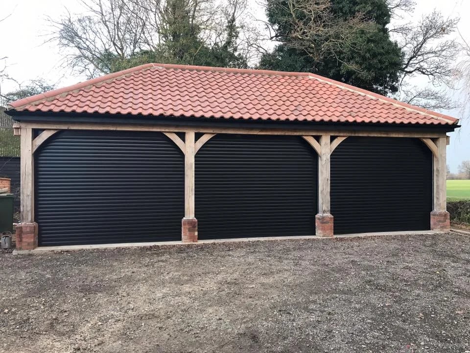 Bespoke oak cartlodges crafted by Beagrie Co Ltd showing traditional timber construction