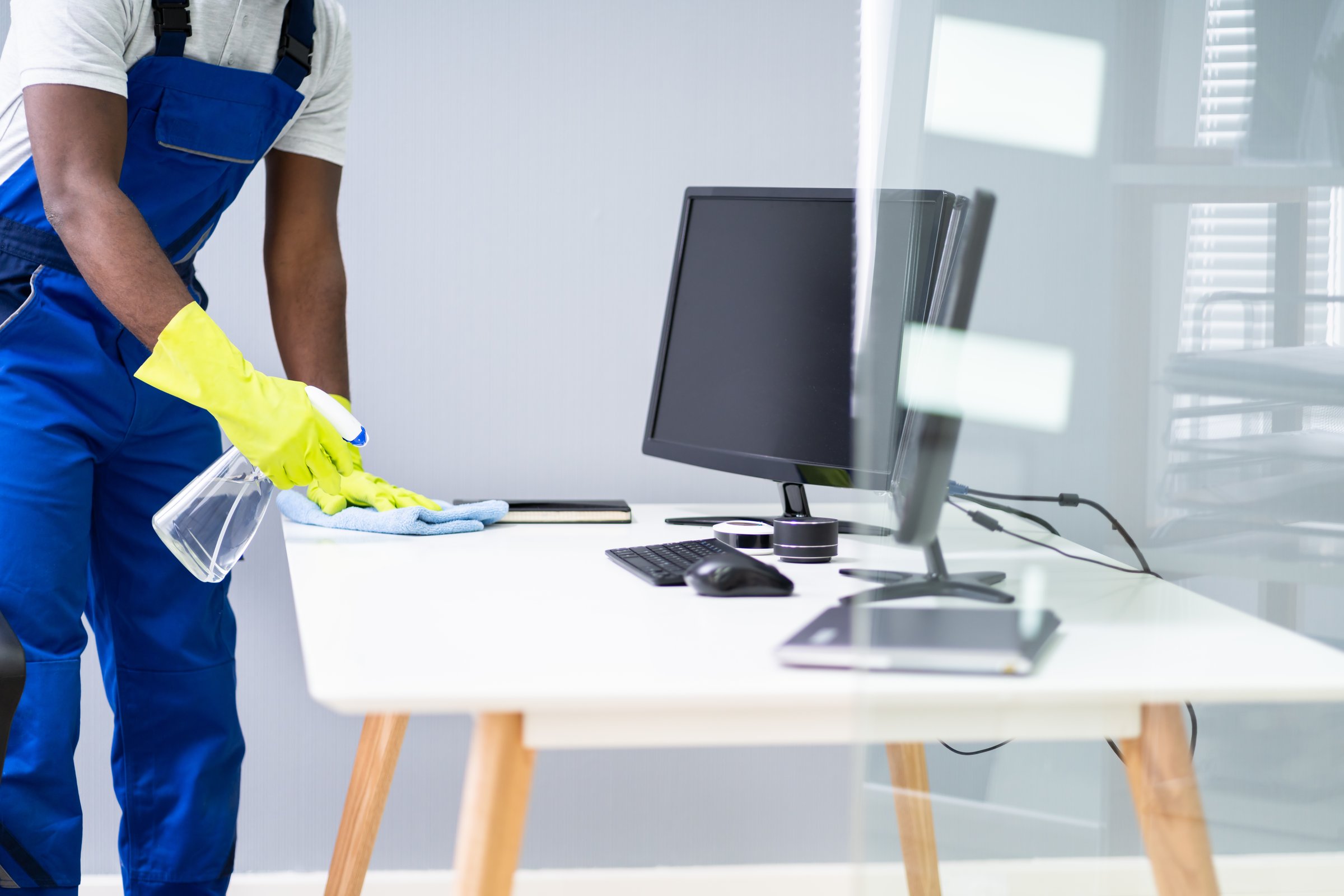 Professional Workplace Janitor Service. Office Desk Cleaning