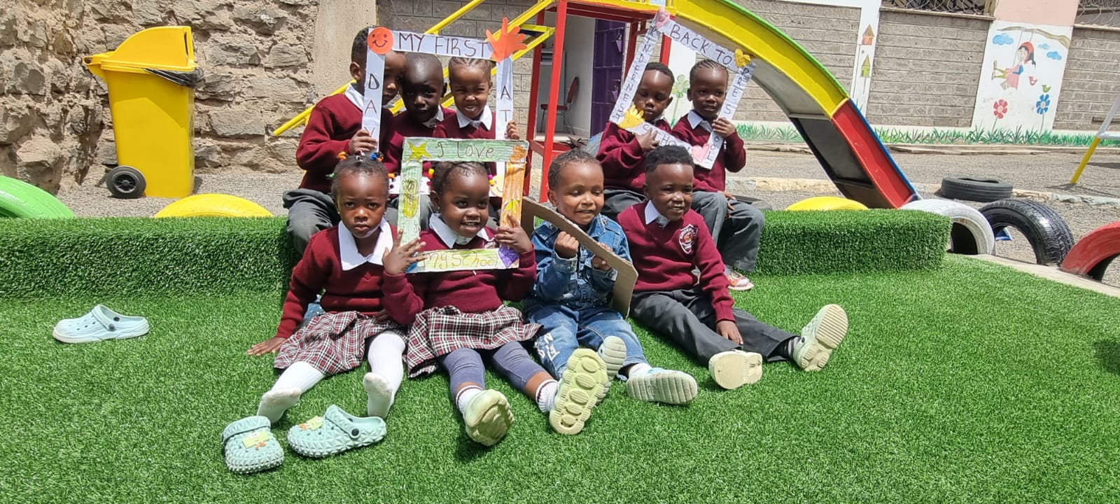 Children playing on outdoor equipment