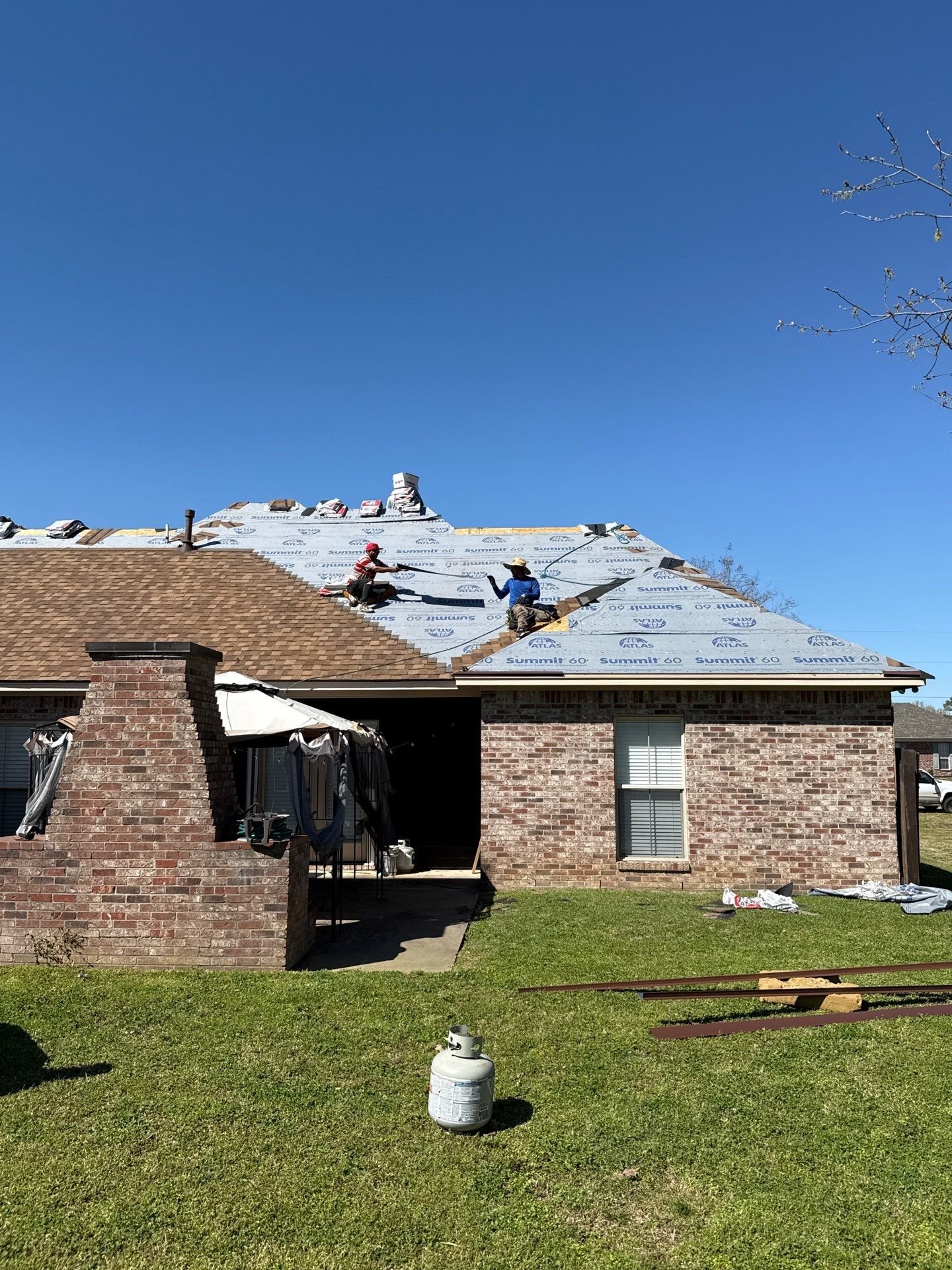 Modern house with gray asphalt shingle roof