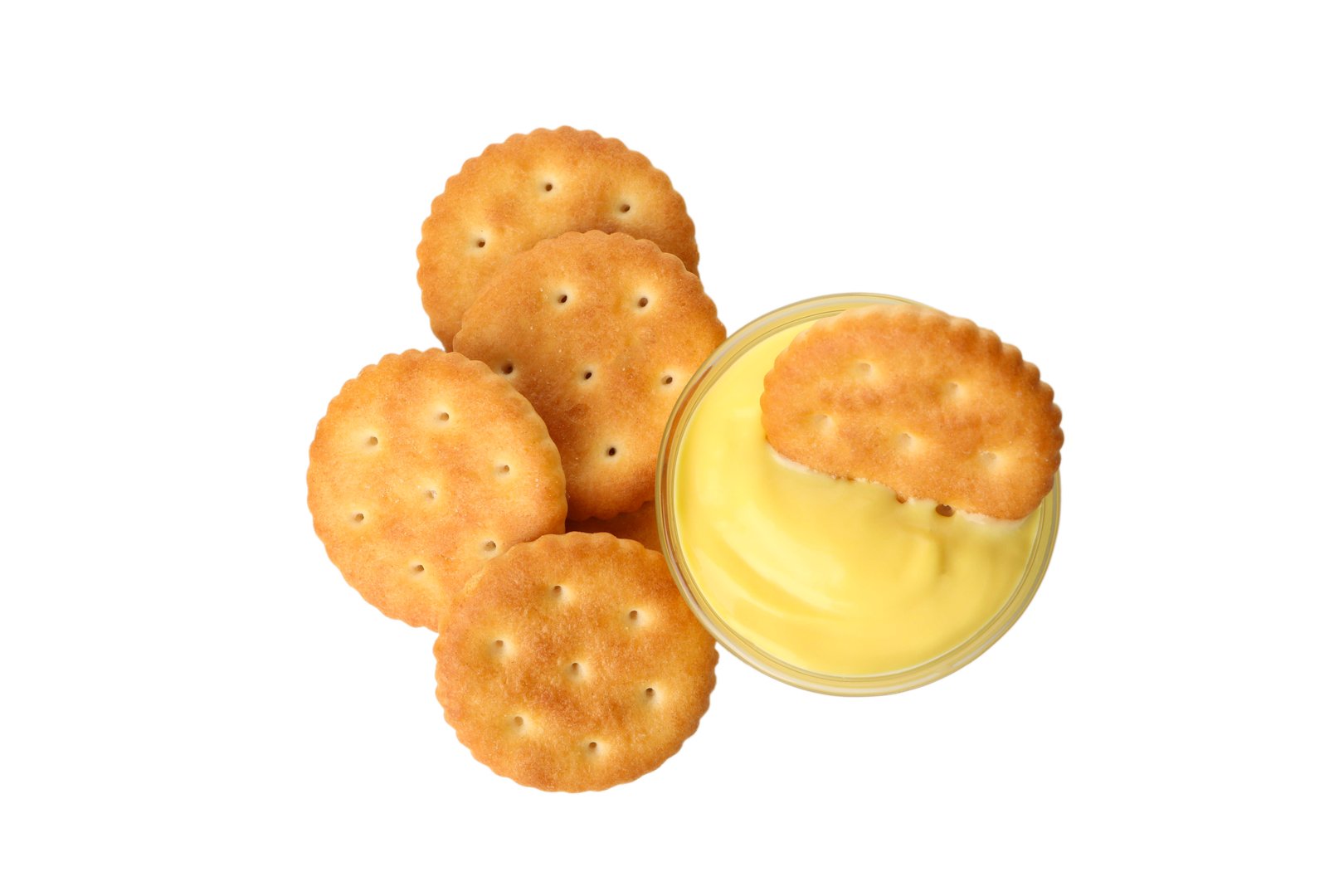 Cracker biscuits and cheese sauce isolated on white background